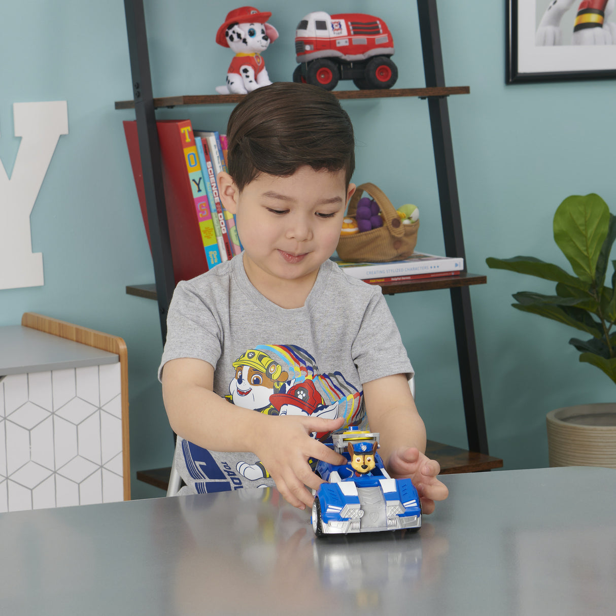 PAW Patrol Chase’s Deluxe Movie Transforming Toy Car with Collectible Action Figure