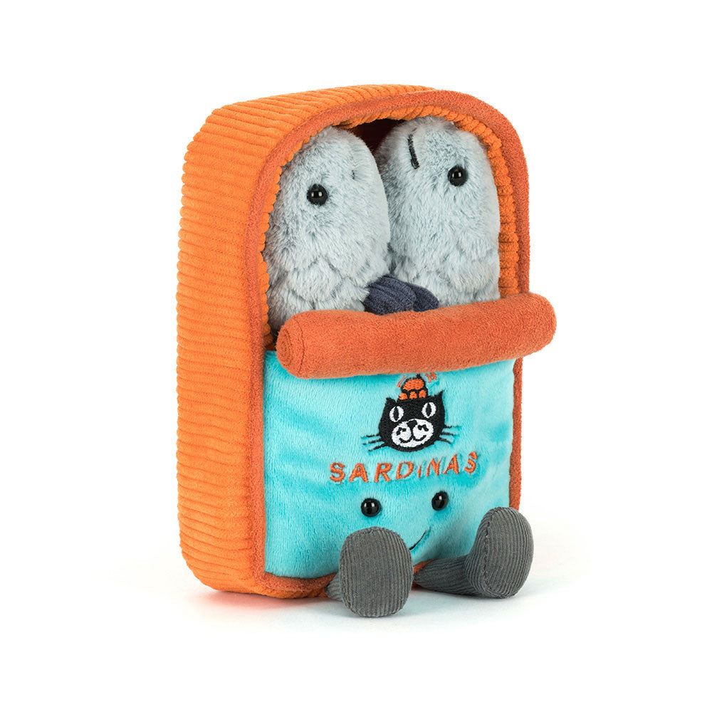 Plush toy with two gray fish inside an orange and blue container labeled 'Sardinas'.